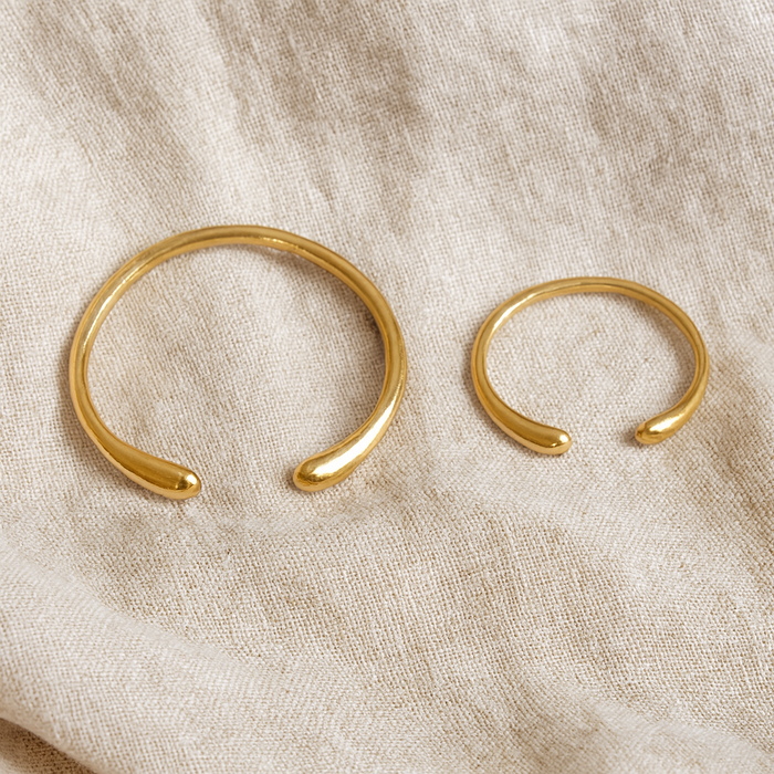 The Bantu bracelet available in two base sizes (4.5cm and 6.5cm), both featuring an adjustable open-cuff design