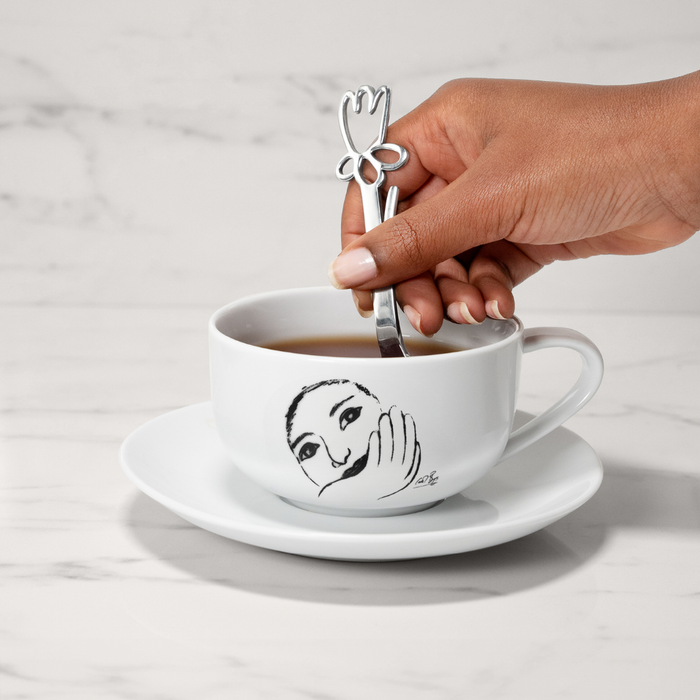 CUP AND SAUCER - face facts