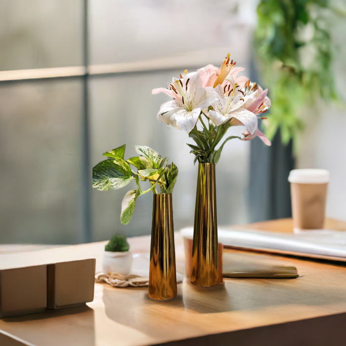 Close-up of the gold-finished iron surface, highlighting the unique artisanal character and minimalist luxury of the vases.