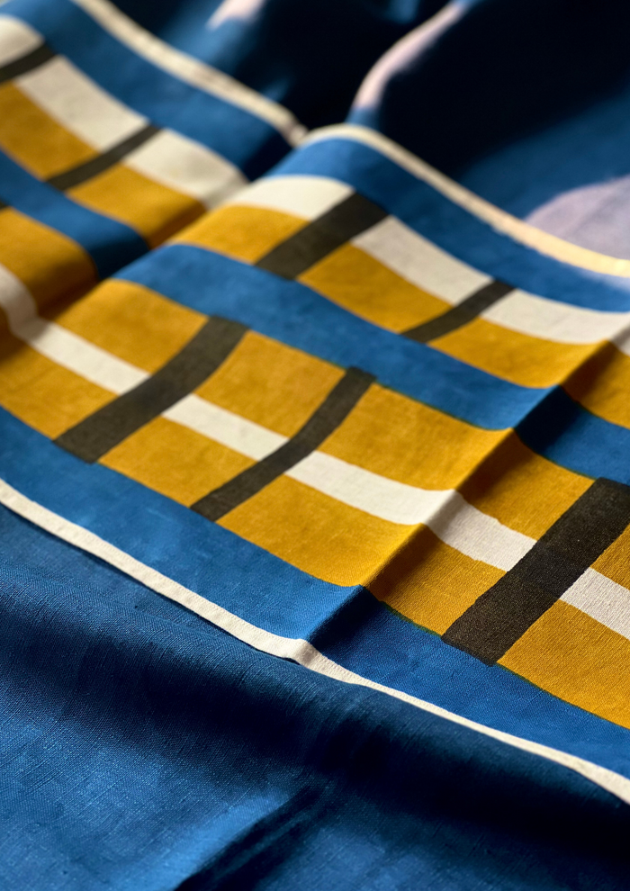 Close-up of the traditional hand-block print on soft linen, showing the beautiful artisanal irregularities and natural texture.