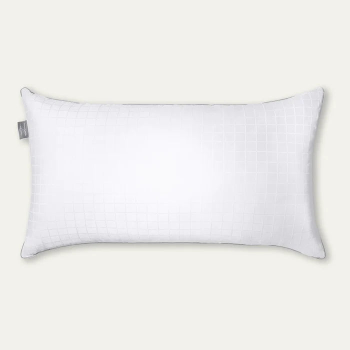 White pillow on a light beige background