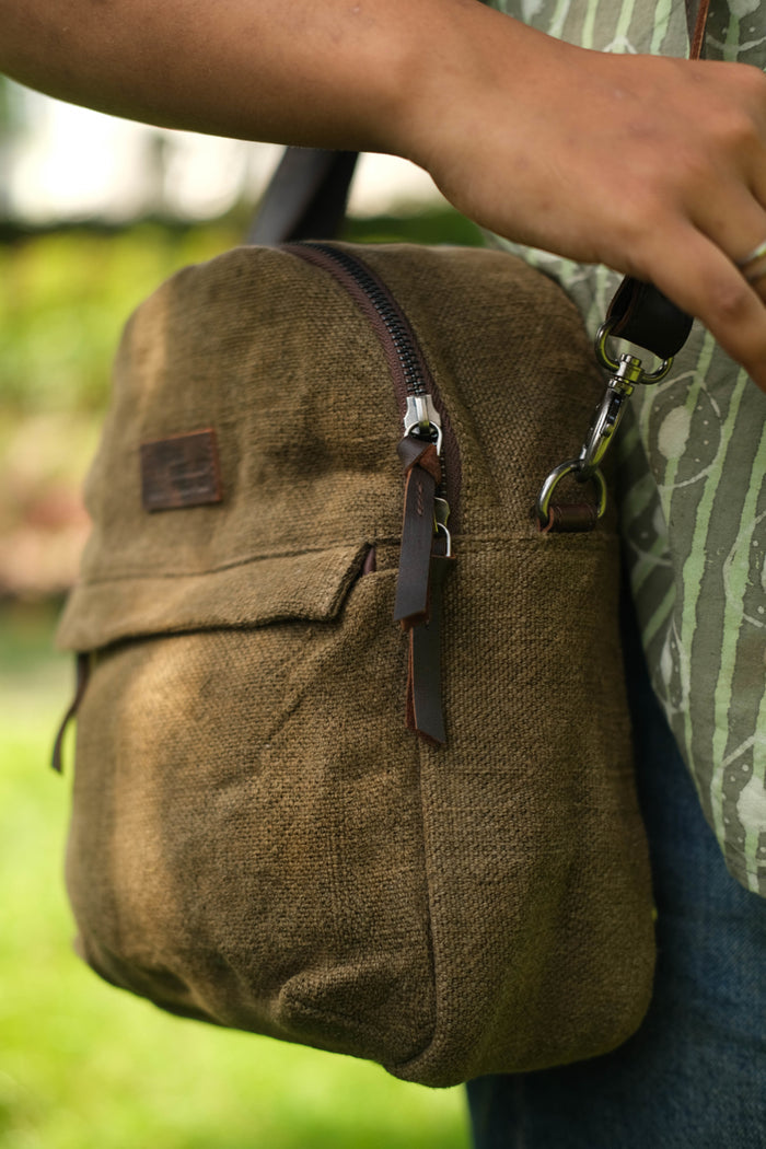Interior view of the Lil Sister bag showing the mobile phone compartment and secure lining.
