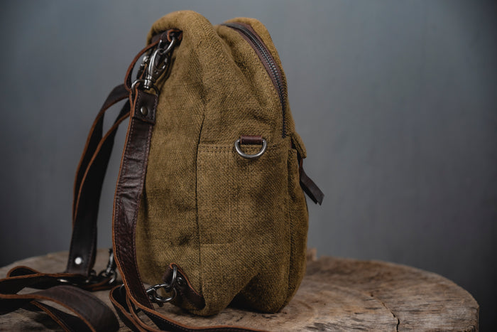 Convertible Lil Sister bag in sustainable jute shown as both a mini backpack and crossbody sling by Kalaa.