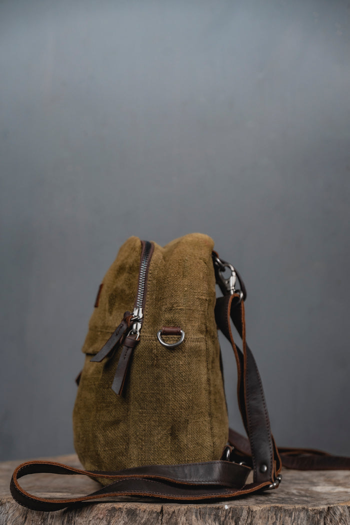 Convertible Lil Sister bag in sustainable jute shown as both a mini backpack and crossbody sling by Kalaa.